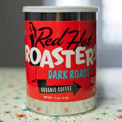 Steel 11oz can of dark roast coffee.