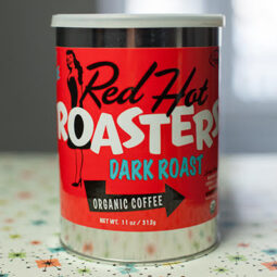 Steel 11oz can of dark roast coffee.
